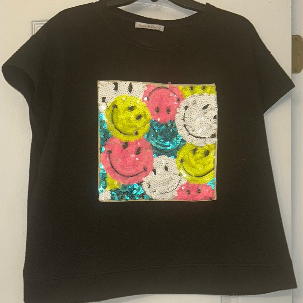 Vibrant Black and Pink Blouse with Playful Graphic